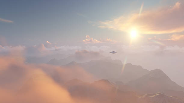 istock 3D illustration UFO over the mountains 1410046863
