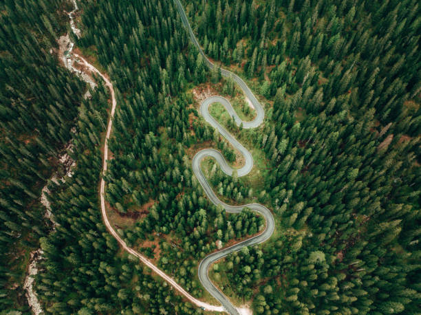 istock winding road aerial view 1410052716