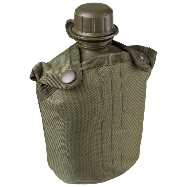 istock Army water bottle in a green case, white isolated background. 1410053201