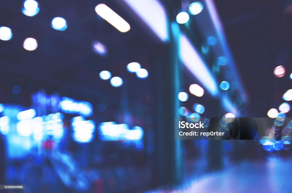 storefronts in cold night street, defocused Night Stock Photo