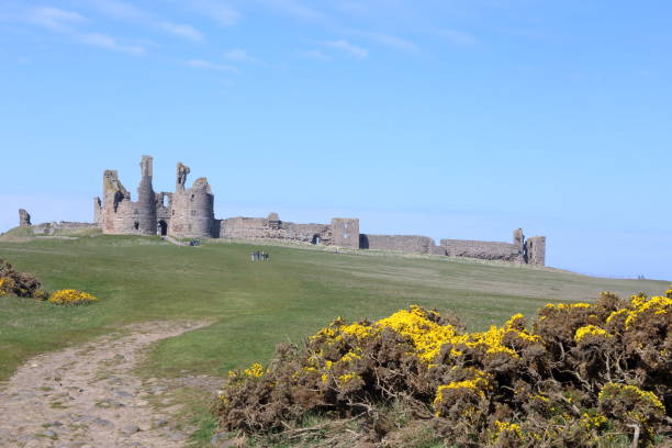 istock Dunstanburgh Castle Ruins, Northumberland. 1410055323