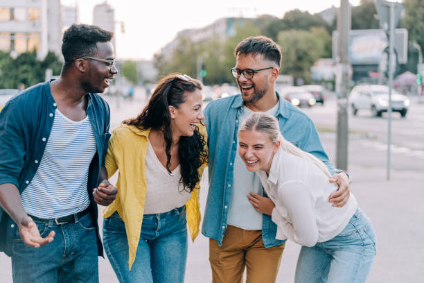 istock Friends having fun outdoors in the city. 1410057048