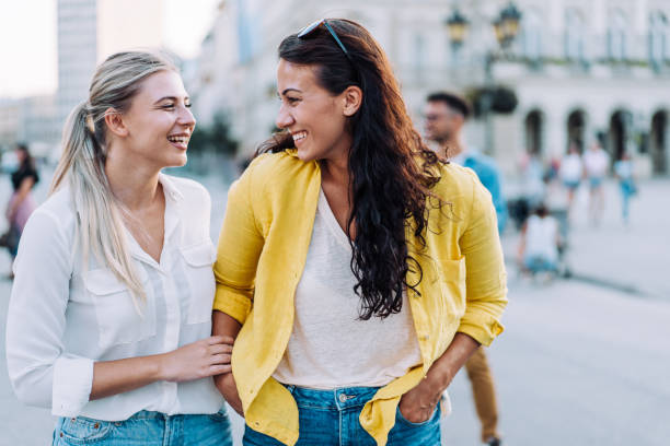 istock Friends having fun outdoors in the city. 1410057051