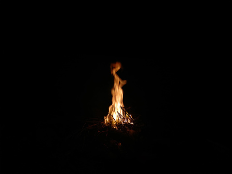Camp fire by the night in the great desert of Sinai, Egypt.