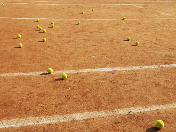 A set of tennis balls that form a natural pattern.
