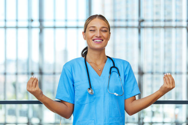 istock Nurse meditating with eyes closed 1410064276