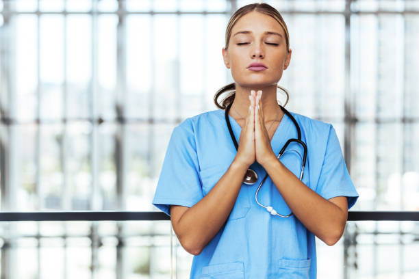 istock Depressed and tired nurse 1410064296