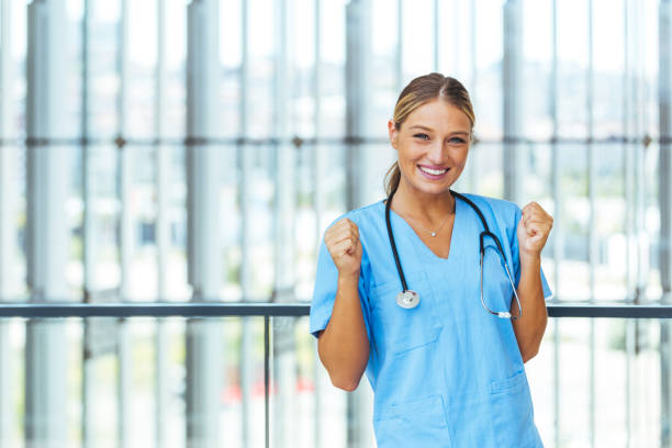 Excited Beautiful Young Female Nurse stock photo