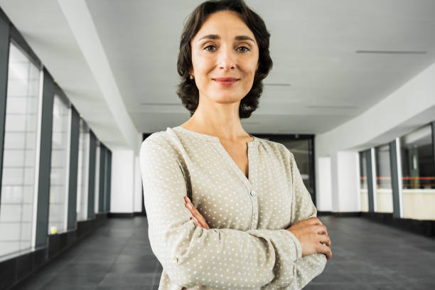 istock Successful Middle-aged business woman looks into camera 1410065416