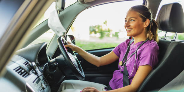 istock Female nurse in the car. 1410067794