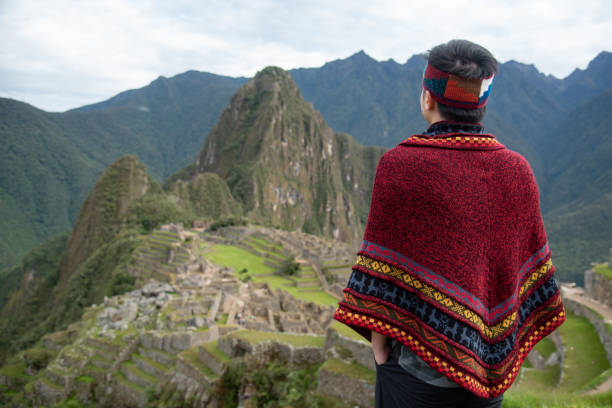 istock Asian man tourist looking at Machu Picchu 1410070674