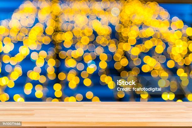 Empty Wooden Table With Defocused Yellow Lights Background Copy Space Stock Photo - Download Image Now
