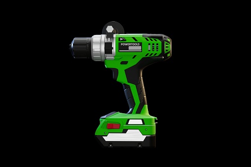 Cordless drill on black background.