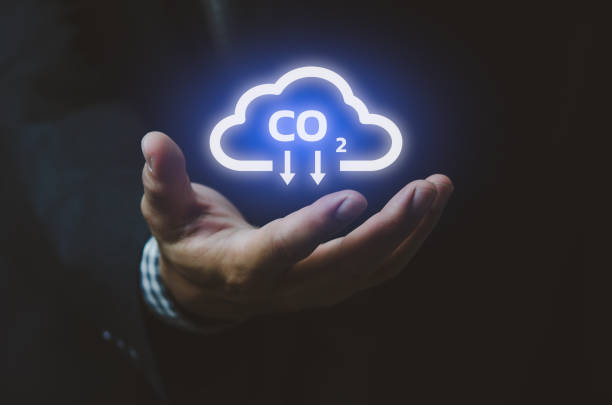 Man hand icon cloud. Sustainable eco energy CO2 emissions and global warming with investment constraints  icons and symbols virtual screen. Business concept. stock photo