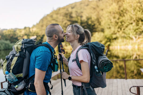 istock A hiking couple kissing 1410081467