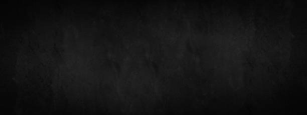 istock Black anthracite stone concrete cement tile or terrace slab texture background panorama banner 1410082742