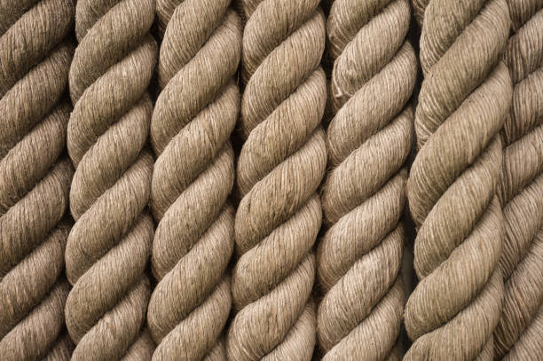 Nautical (naval, sea) braided ropes closeup photo (background)