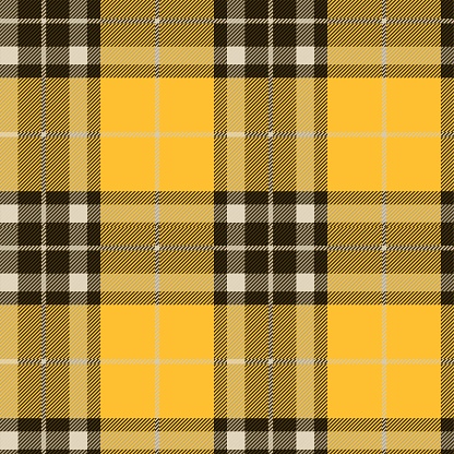 Yellow, black and beige Scottish tartan plaid pattern, fabric swatch close-up.