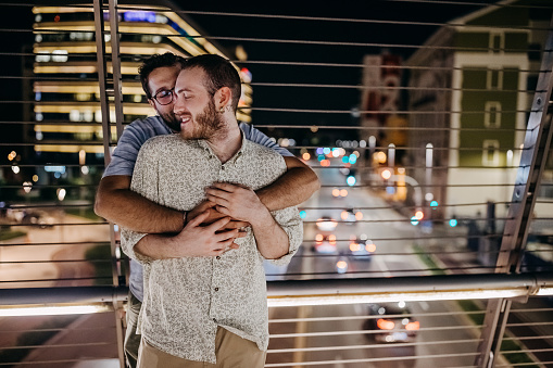 Portrait of gay couple in a city