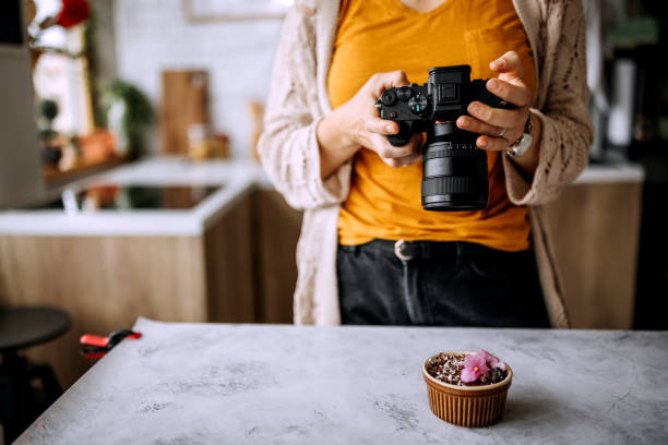 istock Female photographer in her home studio office 1410089068