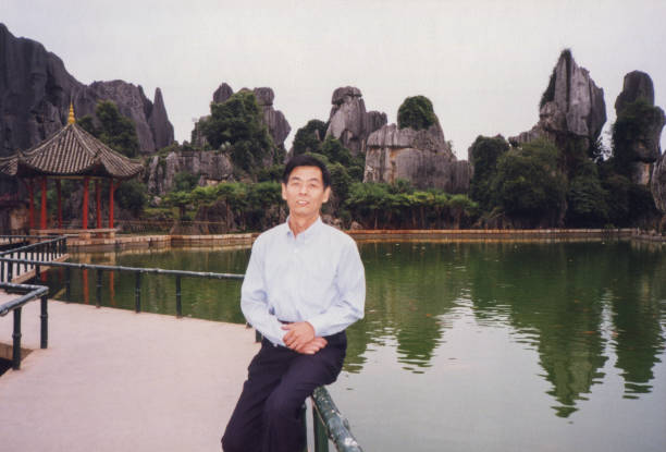 istock 1990s Chinese Men Real Life Old Photo 1410090581