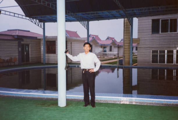 istock 1990s Chinese Men Real Life old photo 1410090588