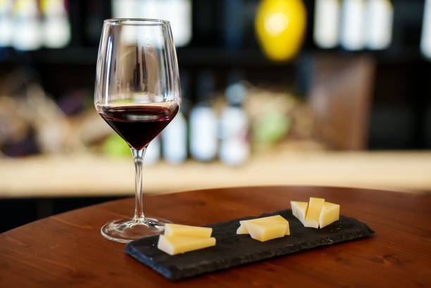 istock Glass of red wine and cheese. 1410090934