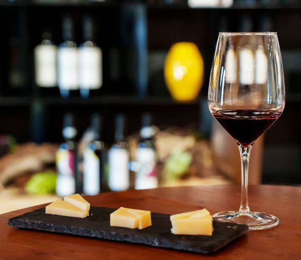 istock Glass of red wine and cheese. 1410090938