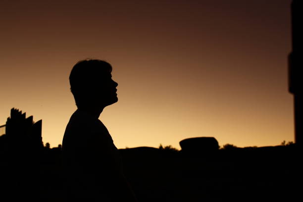 istock Lady silhouette at dusk 1410098780