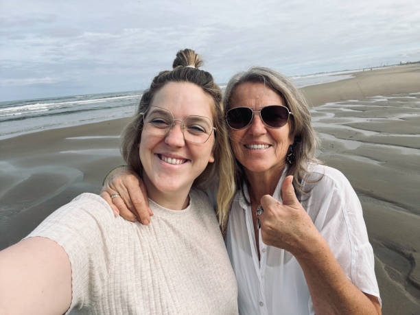 istock Mother and daughter at the beach 1410099784
