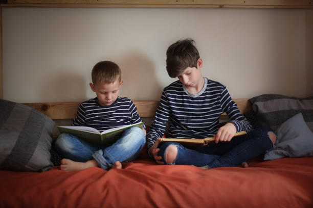 istock The brothers read together on two bunk beds 1410105540