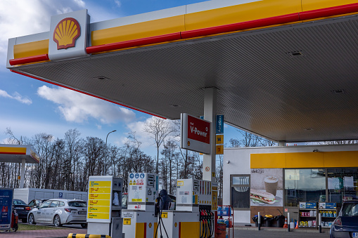 South Australia, Australia – February 12, 2020: Exterior view of a Shell service station with blue sky and clouds.