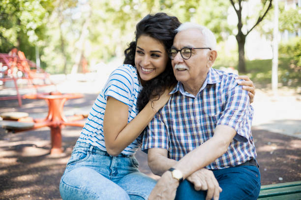 istock Happy father and daughter enjoying time at park 1410107789