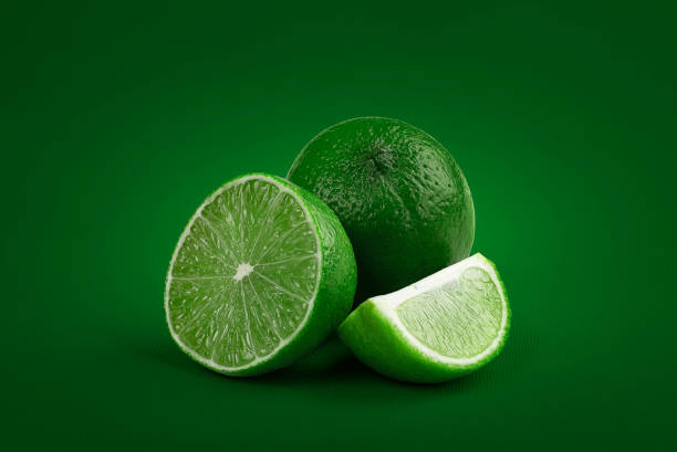 istock Lemon in studio shot with textured green background, and sharpness throughout the subject area. 1410107897