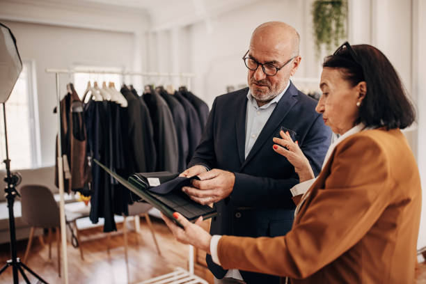 istock Man buying a new suit 1410113865