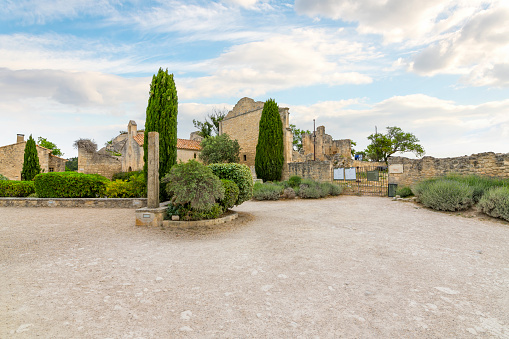 The ruins of the medieval castle including the historic hospital site at the village of Les Baux-de-Provence in the Alpilles mountains of Southern France.