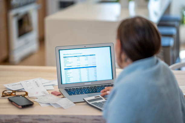istock Woman Budgeting At Home 1410116199