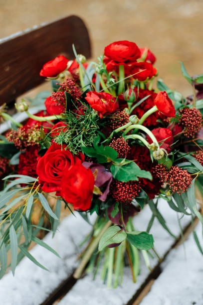 istock Winter wedding bouquet of red roses 1410117700