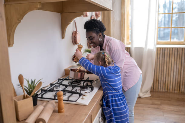 istock A woman and a girl looking busy while doing some housework 1410123161