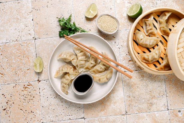istock gyoza dumplings  on a white plate with soy sauce 1410124184