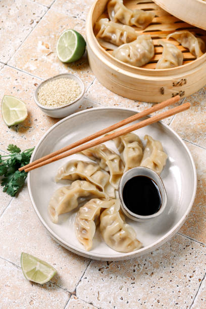 istock gyoza dumplings  on a white plate with soy sauce 1410124220