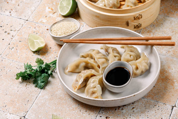 istock gyoza dumplings  on a white plate with soy sauce 1410124223