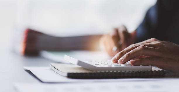 istock legal Business advisor  working at office with documents on his desk, doing planning analyzing the financial report, business plan investment, finance analysis concept 1410125336