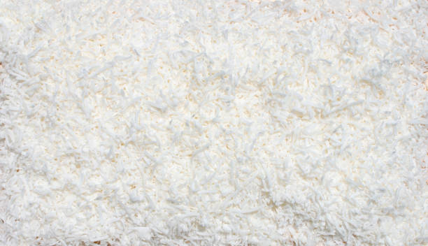 istock pile shaved coconut shaving shavings cut fresh fruit display cooking background food pattern large dry coconuts 1410127229