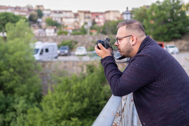 istock Latin type young man tourist in exotic town 1410130155