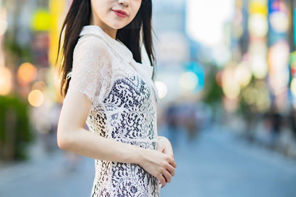 istock Anonymous woman standing in downtown 1410130163