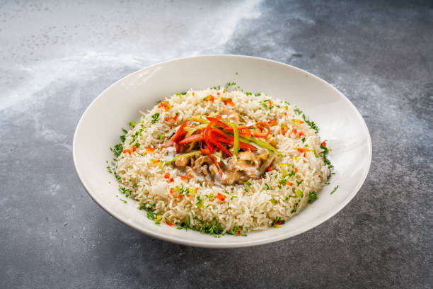 istock chicken stoganoff with buttered rice served in dish isolated on dark background side view 1410130861