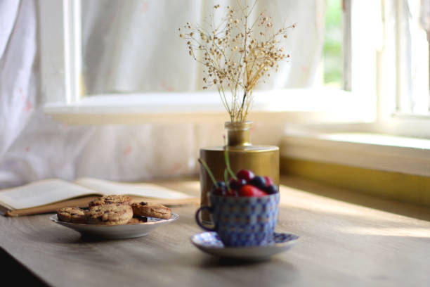 istock Cookies, Berries, Book and Flowers 1410131983