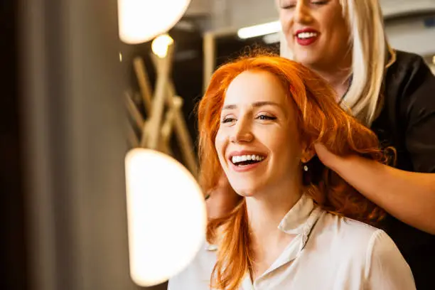 Photo of Smiling woman at hairdresser