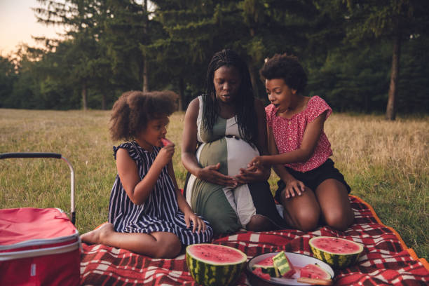 Multiracial family going for a picnic in a public park